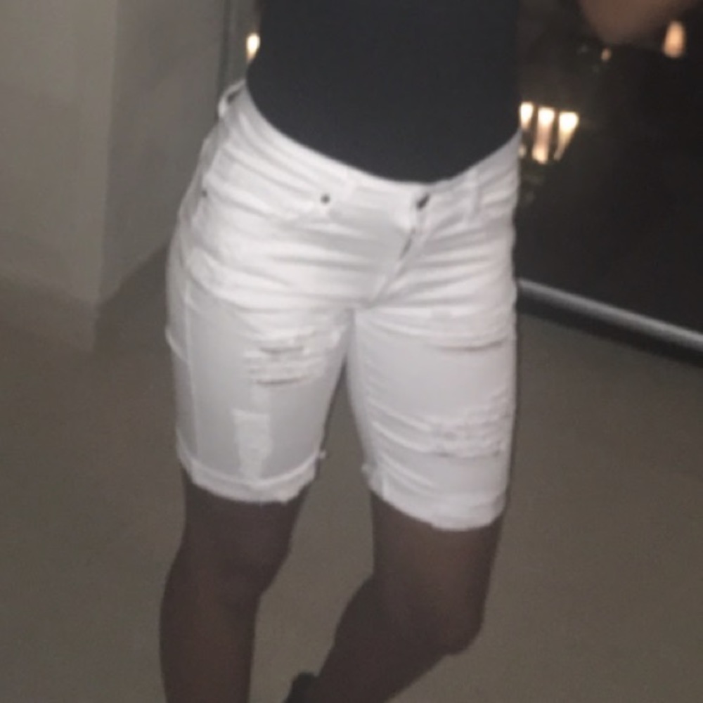 White distressed jean shorts